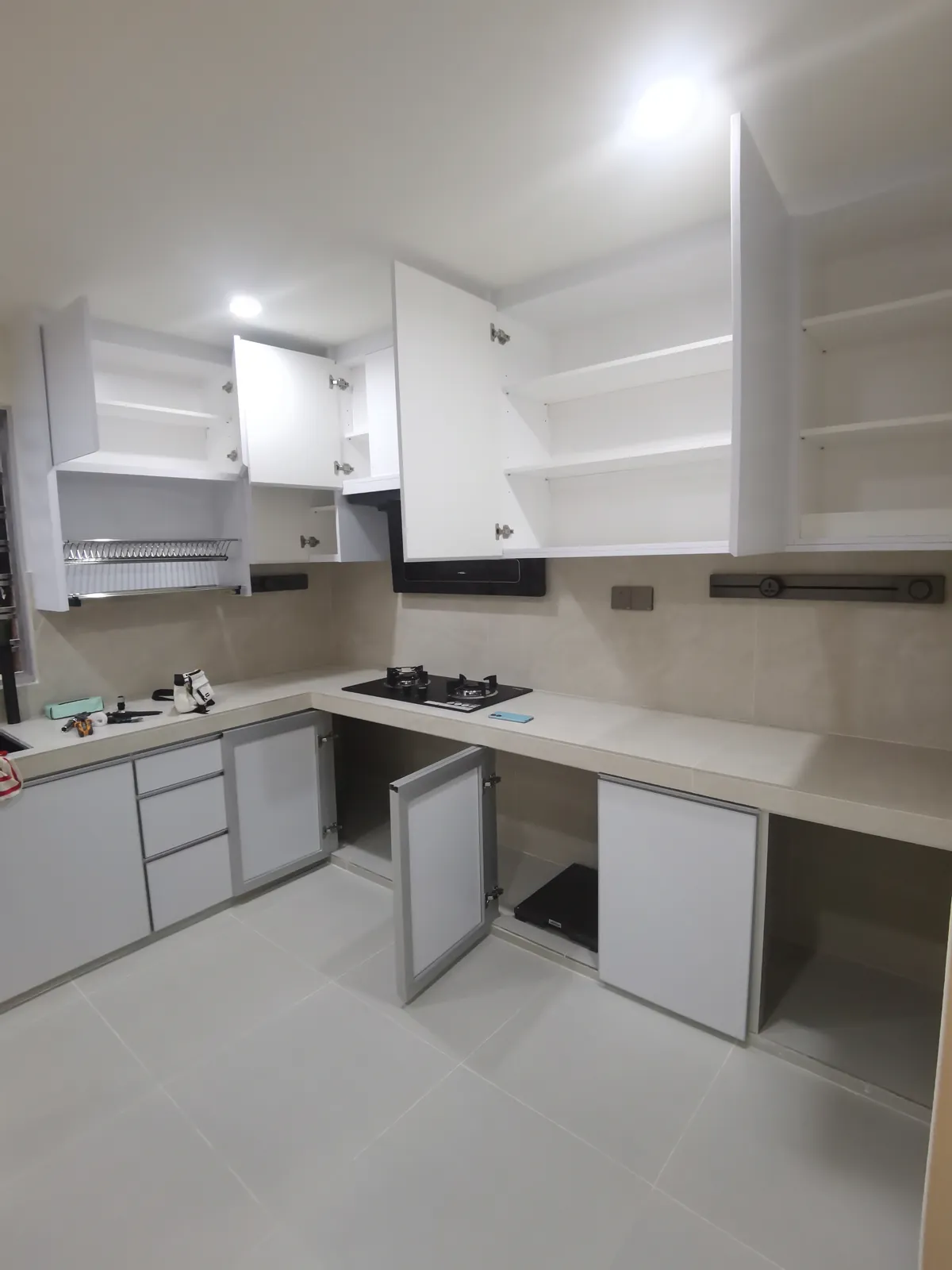 Kitchen cabinet installation during residential renovation in Rawang